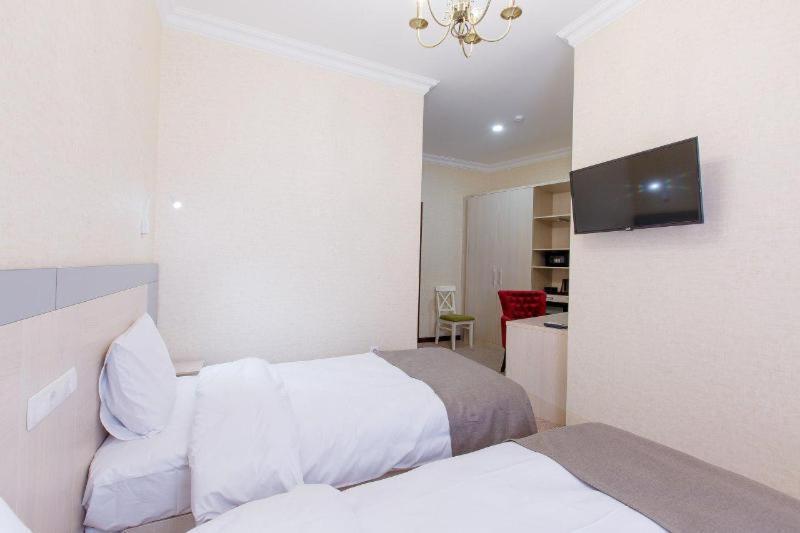Navruz Hotel Tasjkent Værelse billede